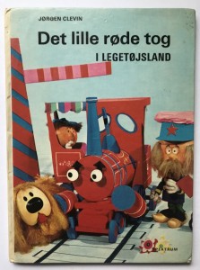 Det lille rde tog i legetjsland af Jrgen Clevin