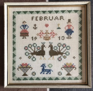 Februar indrammet broderi