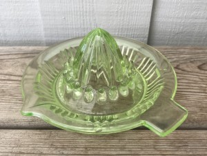 Grn glas citronpresser